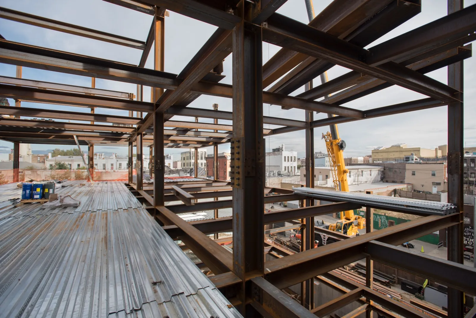 New Development in Brooklyn with the Steel Frame Visible and Building Skyline in the Background.